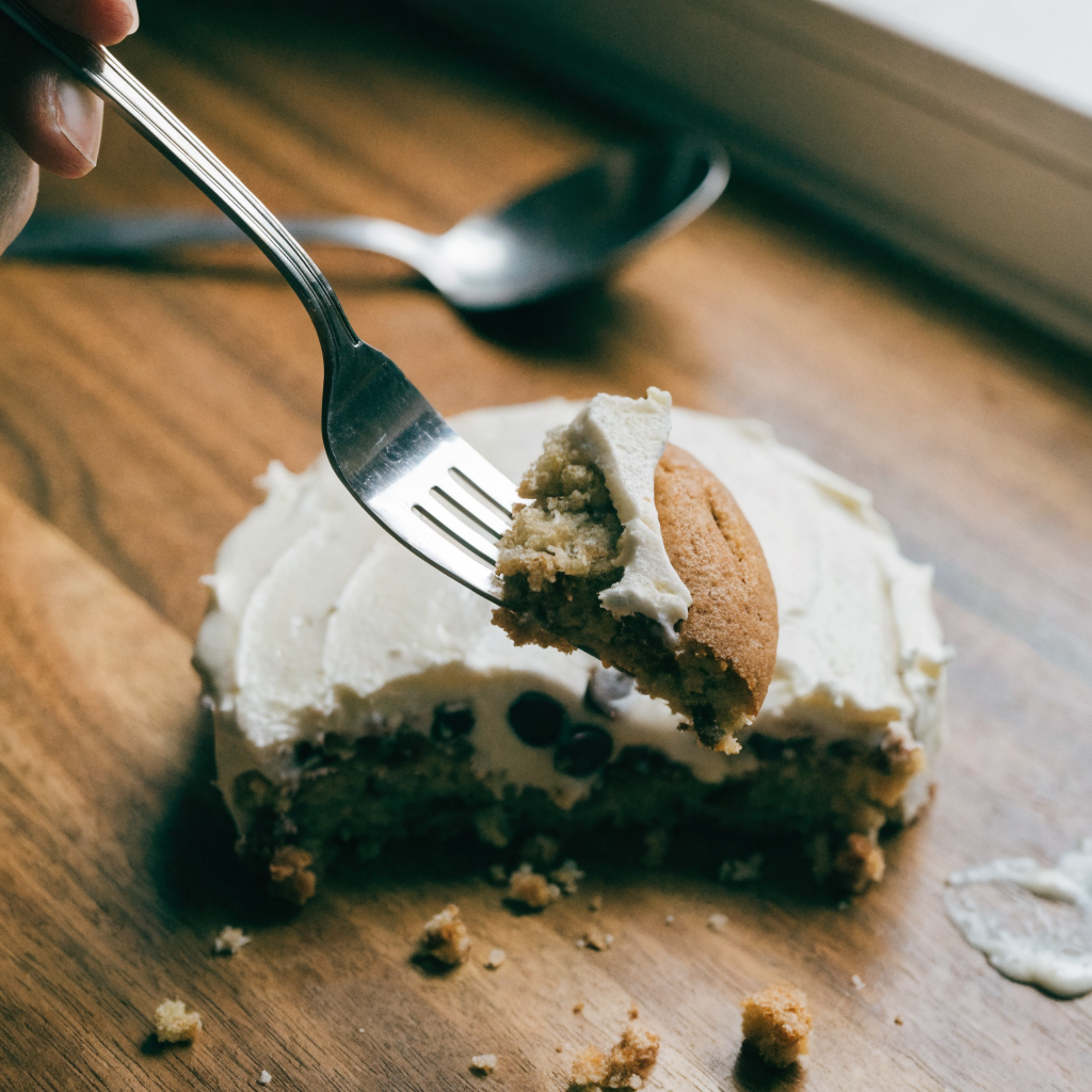 Close-up of vanilla cookie dough cake with baked cookie pockets