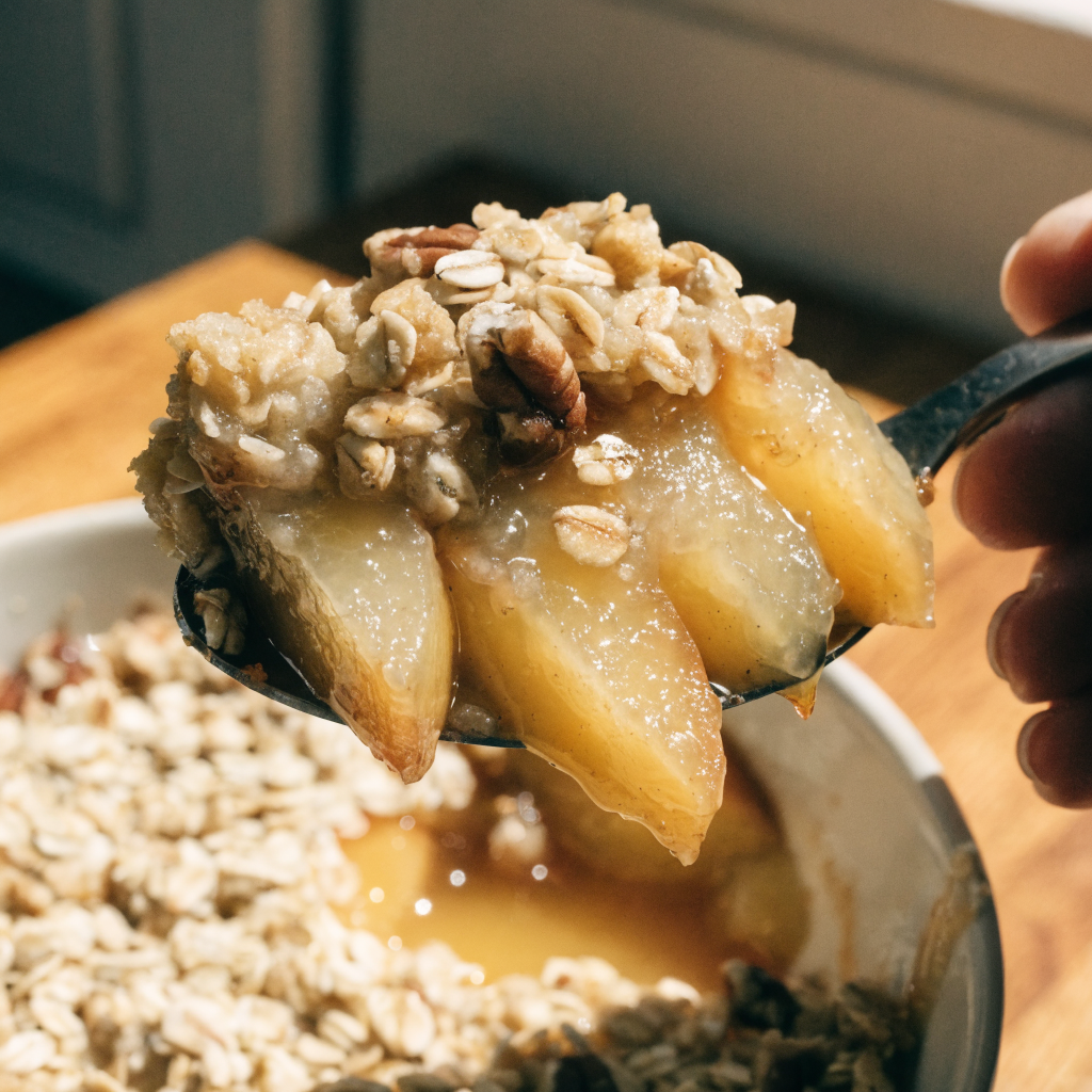 Close-up of reliable peach crumble with crisp oat topping