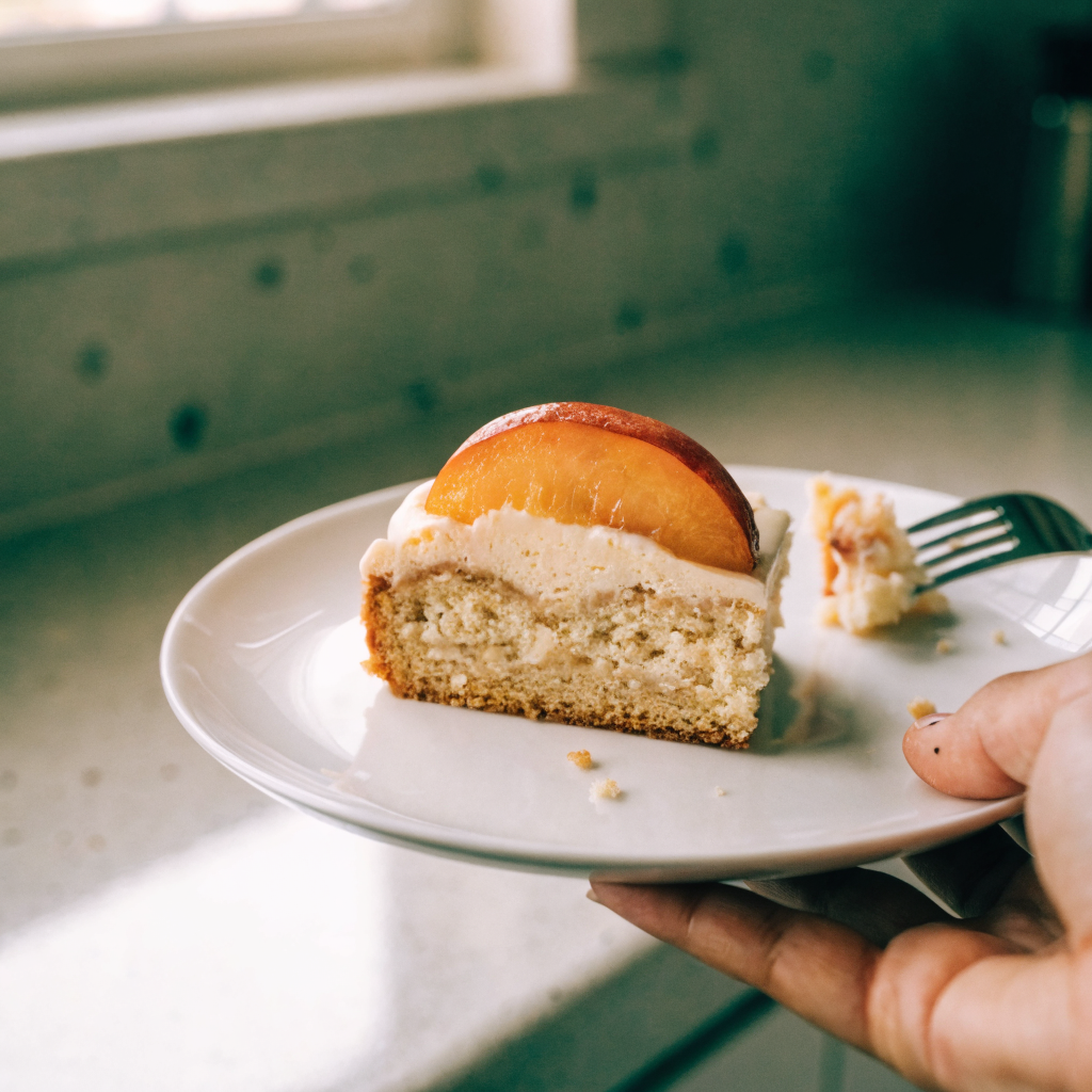 Close-up of peaches and cream cake